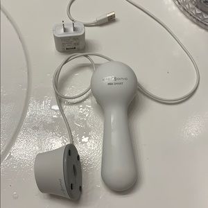 White Mia Smart Clarisonic unit and Charger